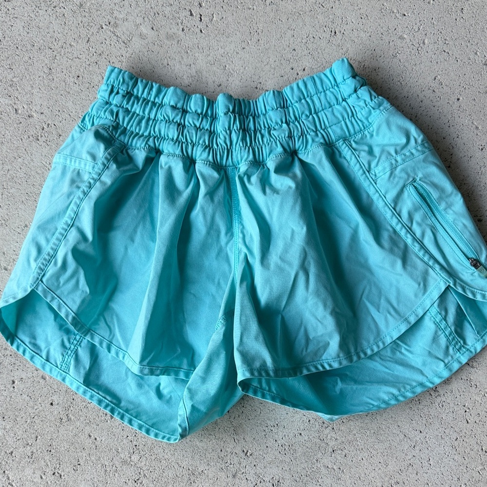 Teal Lululemon run tracker short size 6